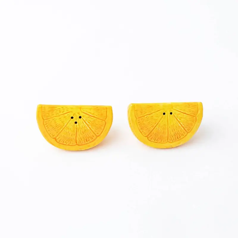 Citrus-Inspired Orange Slice Salt And Pepper Shakers 1