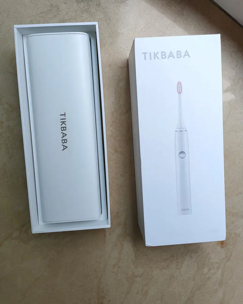 Tikbaba Sonic Electric Toothbrush – Rechargeable Whitening Brush With Two Replaceable Heads (White) 1